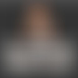 Vann Lim in a denim dress pondering against a dark background with text: Why Convenience Drives Long-Term Property Value?