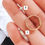 Miniatura: Argollas clicker doradas diseño lateral en 12 mm diámetro de Titanio ASTM F136