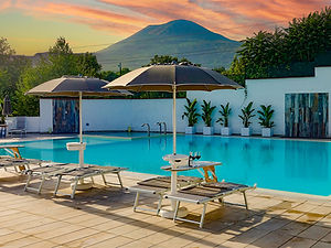 Vesuvio Inn swimming pool with Mount Vesuvius at sunset