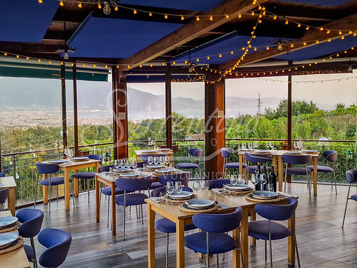 Restaurant dining room with a view of the coast