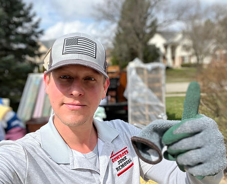 Cowboys Junk Removal Team Leader Ari during an office cleanout