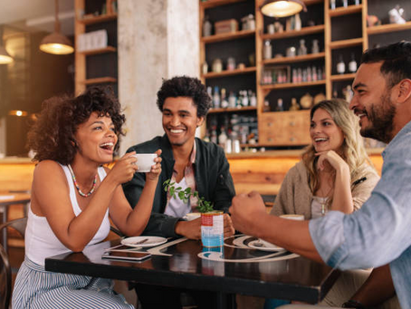 people talking in a cafe