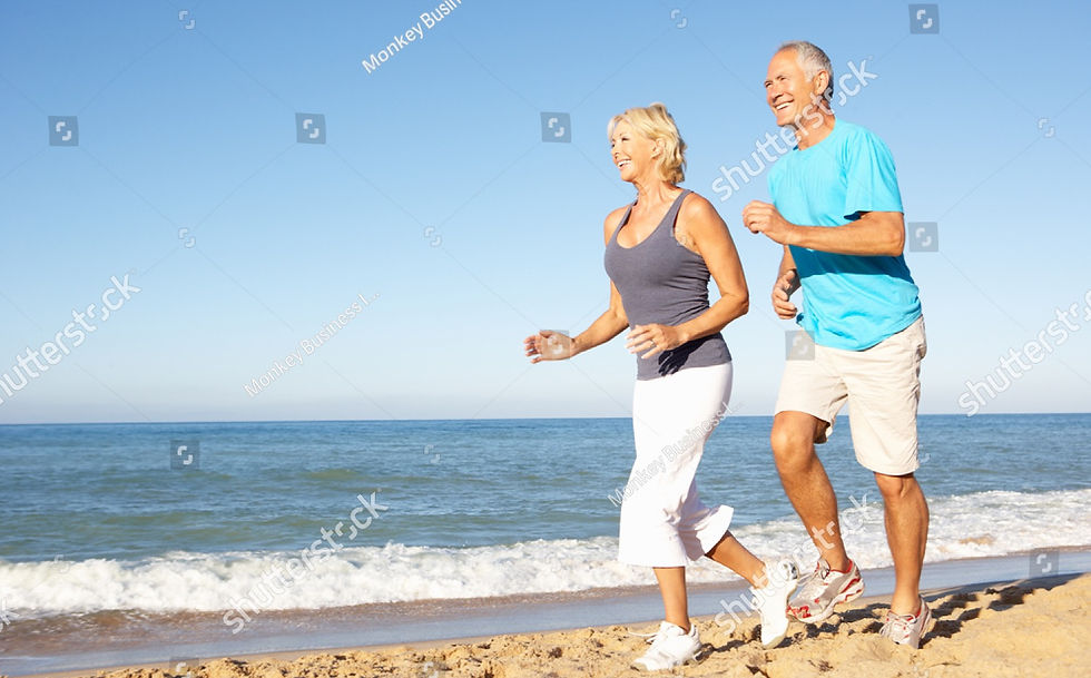 stock-photo-senior-couple-in-fitness-clothing-running-along-beach-64709545_edited