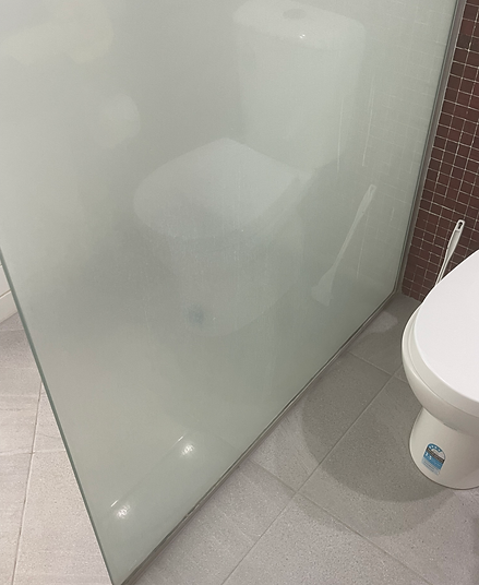 Before Calcium stain removal on broome shower screen clean