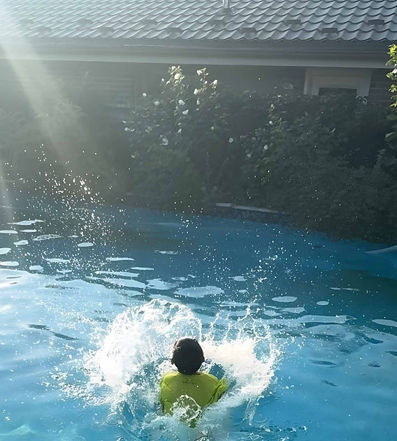Child Splashing Water