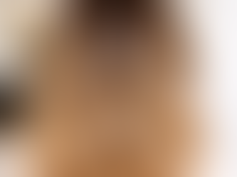 Close-up of natural balayage grow-out showing soft blend from dark roots to warm blonde ends