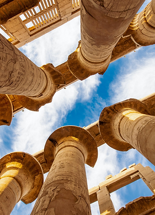 Karnak Hypostyle hall columns and clouds in the Temple at Luxor Thebes_edited.png