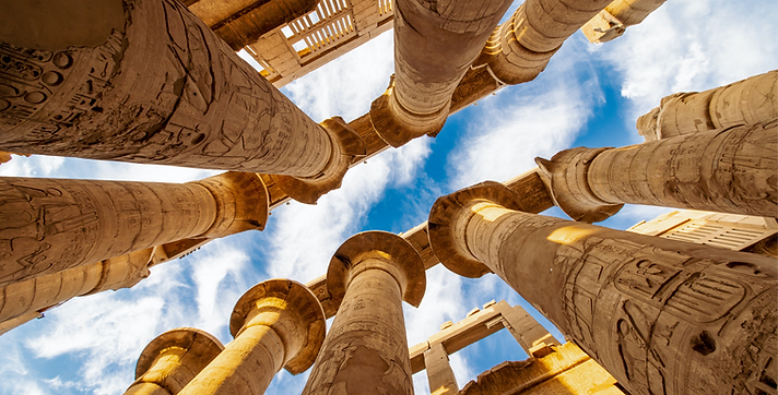 Karnak Hypostyle hall columns and clouds in the Temple at Luxor Thebes_edited.png