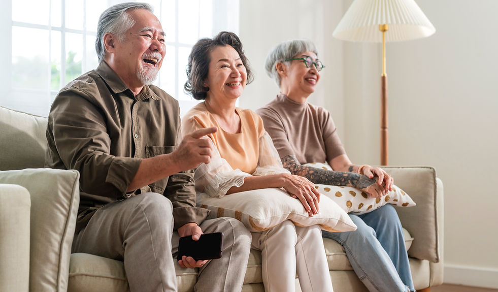 group-asian-old-senior-male-female-spending-weekend-time-together-sit-sofa-couch-watching-