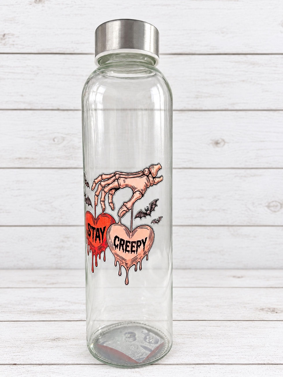 Stay Creepy Glass Water Bottle side view