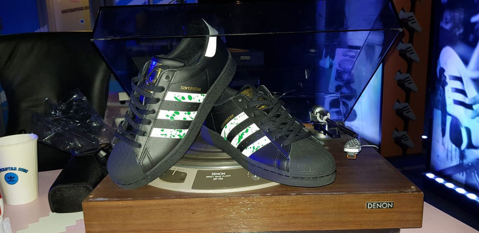 Adidas Superstars 50th Anniversary at D3 - custom black leather painted adidas 3 stripes white and green splashes