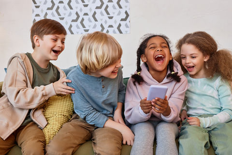 group-of-cheerful-little-kids-laughing-emotionally-2023-05-25-03-02-20-utc.jpg