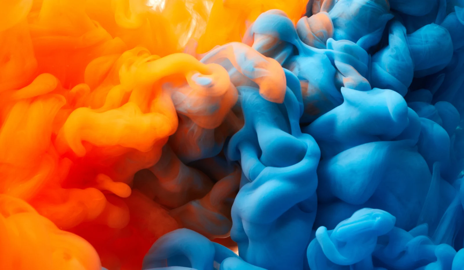Orange-and-blue-smoke.webp