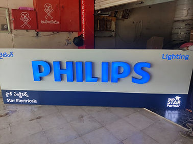 Philips illuminated signage display highlighting professional branding and quality