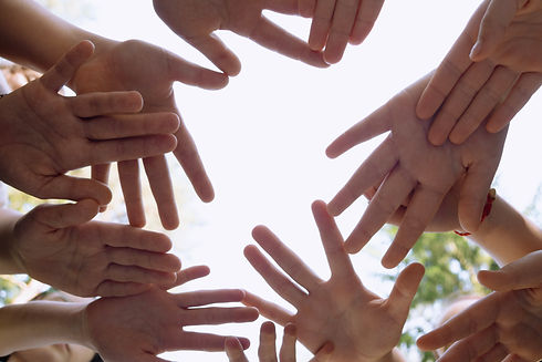 diverse-hands-joining-together-reaching-for-the-sk-2026-03-25-09-36-20-utc.jpg