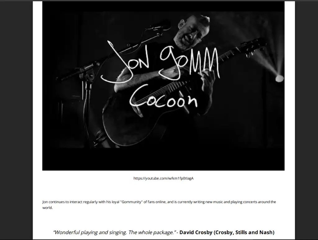 Jon Gomm performing live on stage with acoustic guitar — featured artist in a musician EPK example, highlighting performance imagery and branding elements.