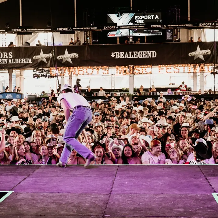 Nik Poli performing crowd work at Cowboys Music Festival 2024