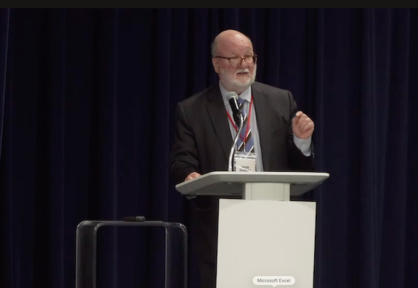 Mark Sandler speaks at antisemitism conference.