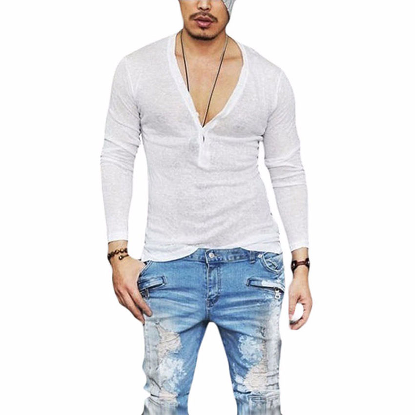 Man wearing a white lightweight everyday tee and jeans