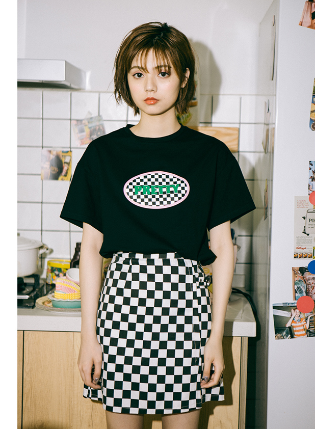 Black-and-white checkerboard A-line mini skirt, front view; T-shirt not included