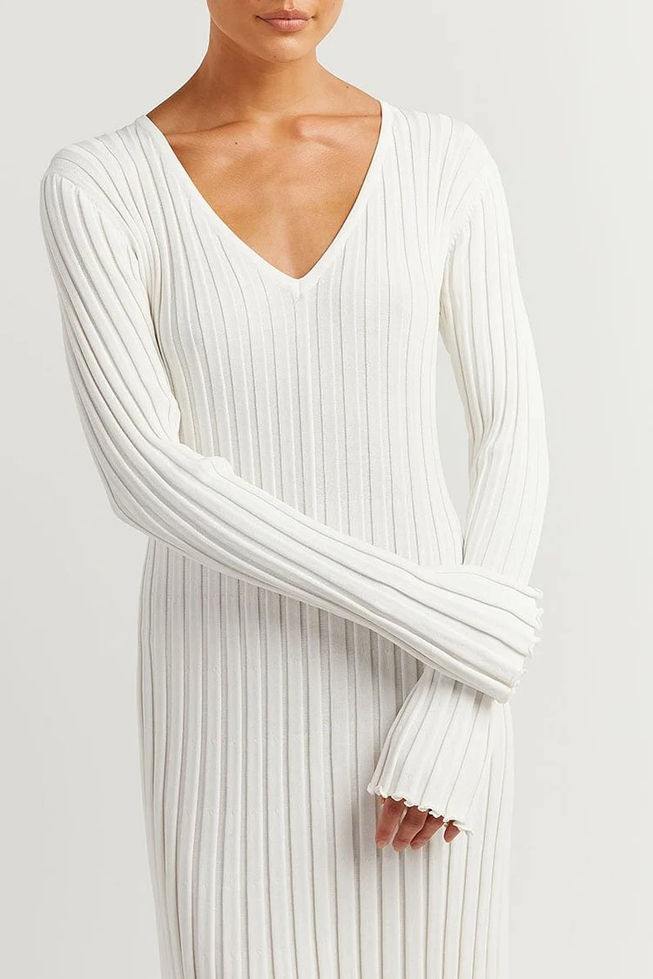 White ribbed dress showing the V-neck and sleeve texture
