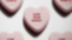 Conversation heart with "Love Your Money."