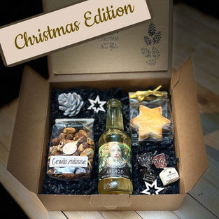 Ein preiswertes Weihnachtspäckli zum Versenden von der Geschenke Manufaktur Feinwerk&Co. aus Bern.