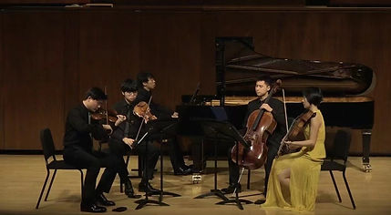Jiahao Han in Paul Hall of Juilliard, with his Amy Beach Piano Quintet