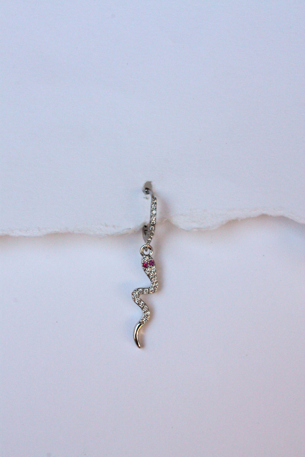 Miniatura: Hoop glitter serpente glitterato con occhi fucsia