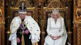 The King and Queen of the UK sat in the Houses of Parliament
