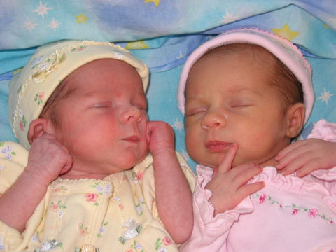twin newborn girls sleeping