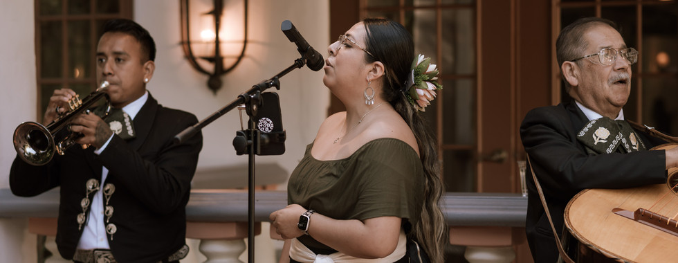 ive band performing at the wedding reception, bringing energy and entertainment to the celebration.