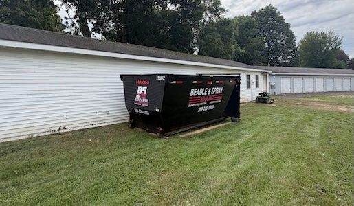 Beadle & Spray roll-off dumpster delivered to a residential driveway in Bangor, Michigan