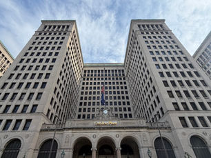 Cadillac Place in Detroit for an article explaining what happens after a harmless error in a Michigan appeal