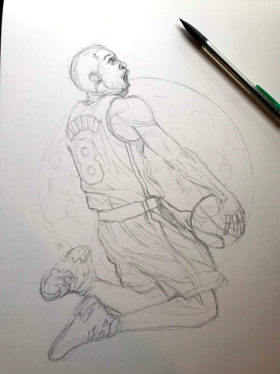 Pencil sketch of basketball player.