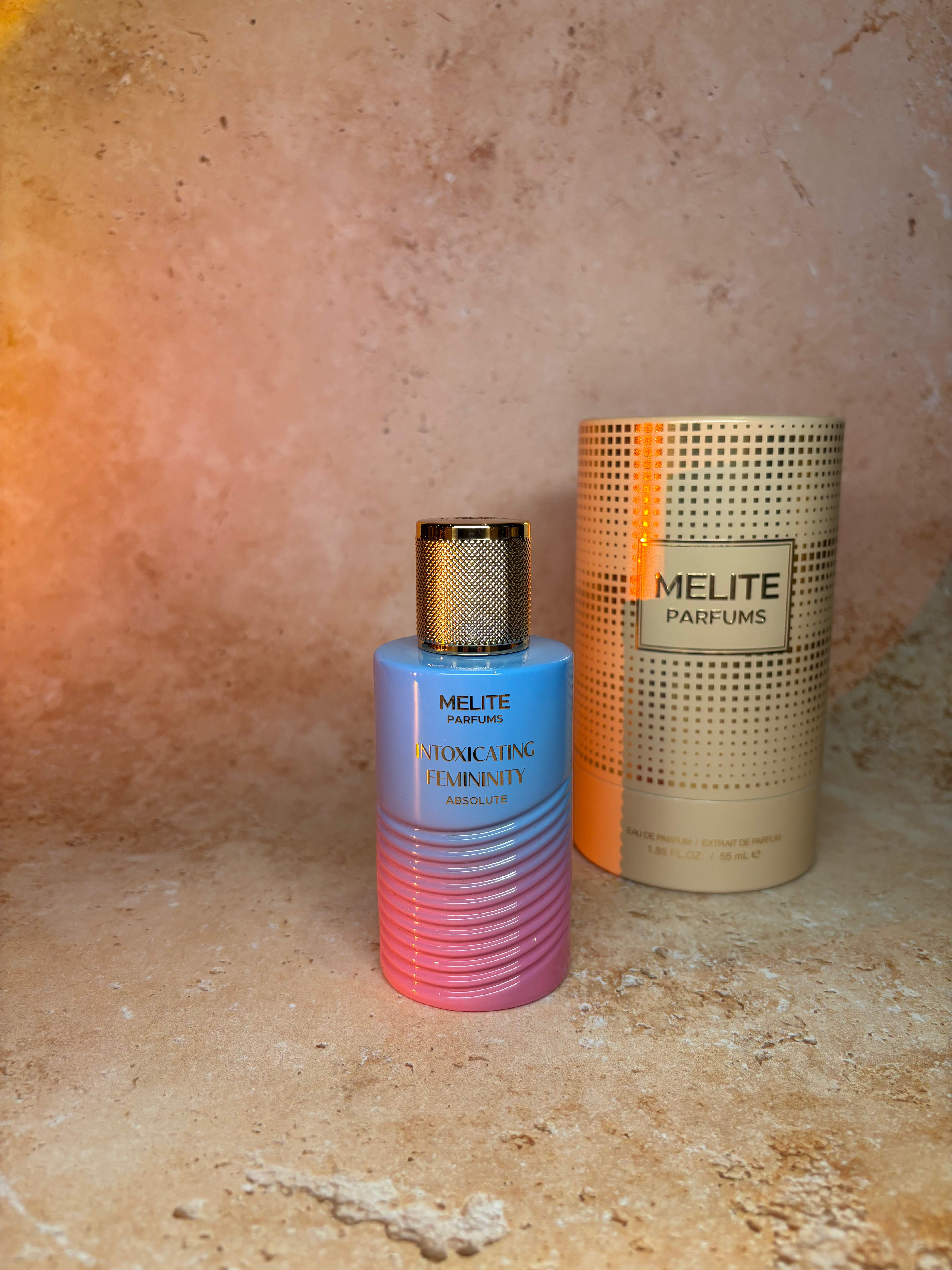 Melite Intoxicating Femininity fragrance bottle and box