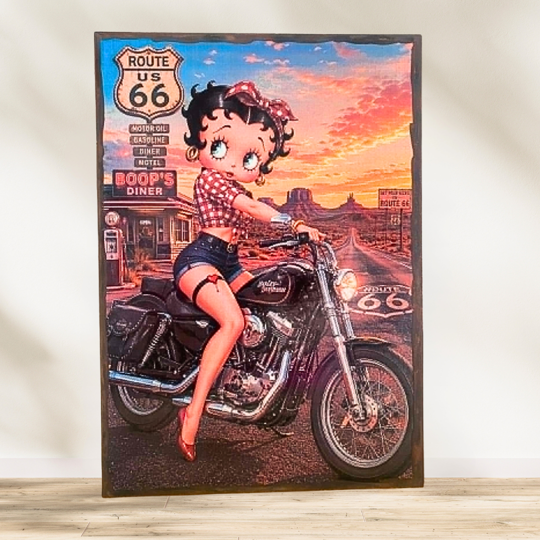 Tableau Betty Boop 💋 Betty Boop n'a jamais pris une ride... elle a simplement changé de monture ! 🏍️ Entre son charme lég