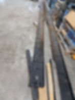 Long metal beams in a workshop