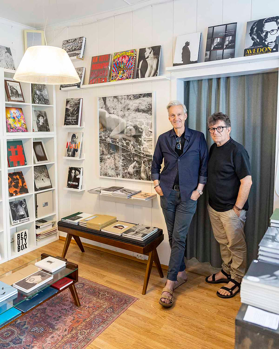 The owners of the photobook bookshop Fotoboka in Oslo, Hans-Olav Forsang and Massimo Leardini, is seen in the bookshop.