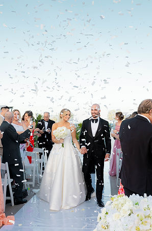 bride and groom wedding walking down the aisle