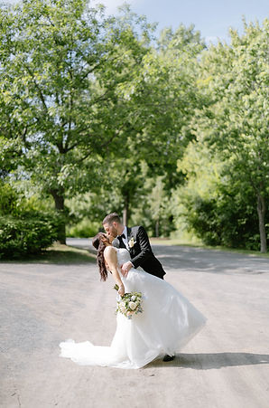 Giulia and Giovanni sharing a romantic dip kiss in Montreal, by Nuvo Photo & Film, Montreal wedding photographers