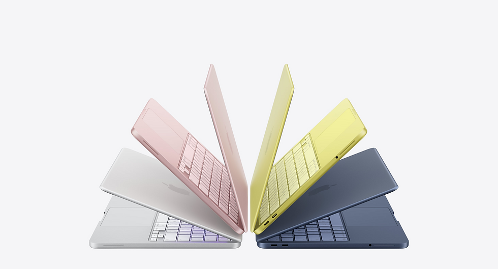 Five laptops in pastel colors (pink, yellow, blue, and silver) fan out against a white background, showcasing their keyboards and sleek designs.