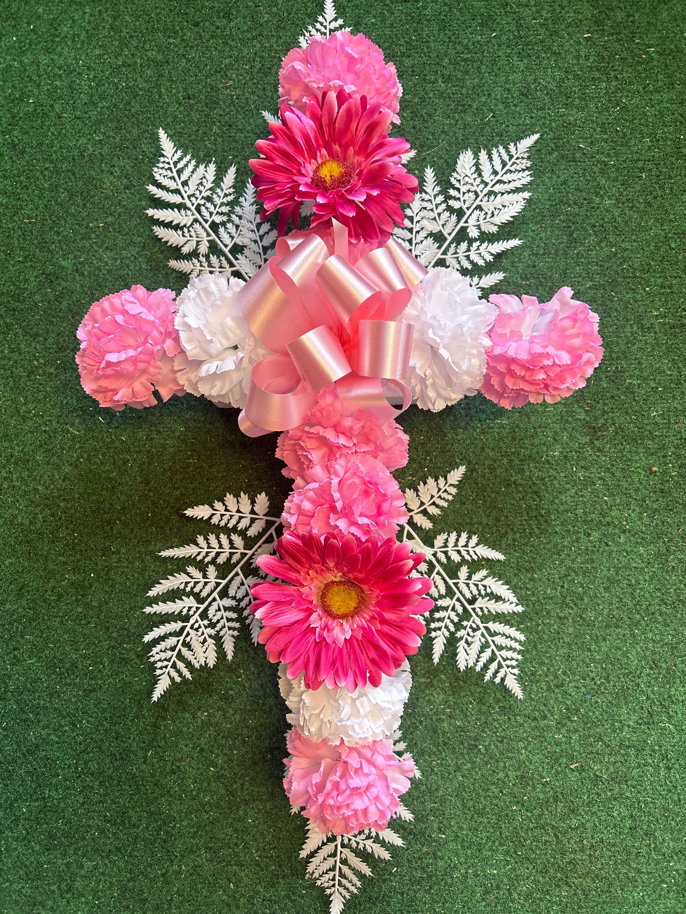 Small cross of silk flowers 