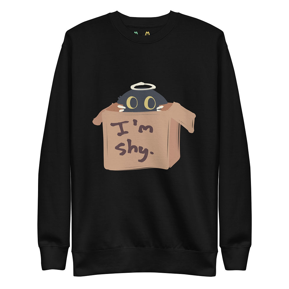 A black sweatshirt with Maow. They are sitting in a brown box, poking their head out so just their eyes are showing. The text "I'm shy" is written on the box.