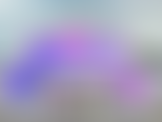 Four members of the Creative Machines install team pose for a photo in front of the monumental artwork.