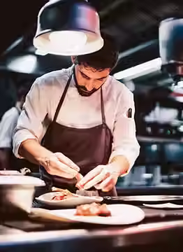 chef in a restaurant.avif