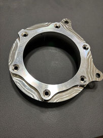 Machined defense component