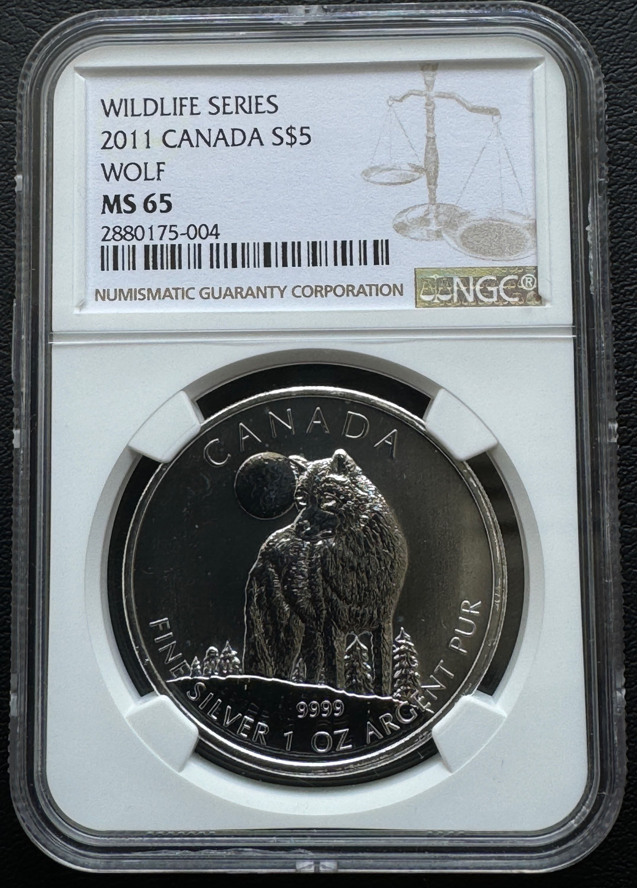 عملة فضية 2011، وزن أونصة واحدة، من كندا، بقيمة 5 دولارات، سلسلة وولف للحياة البرية، NGC MS65