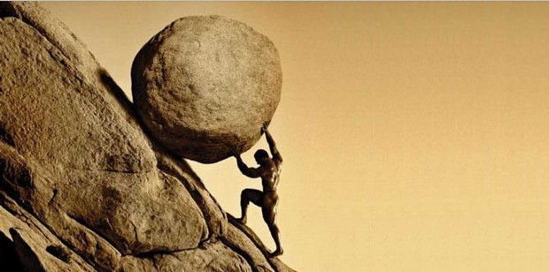 Sisyphus pushing a boulder up a hill