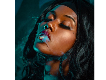 Ethic female model smoking